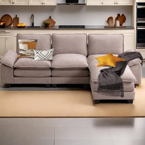 Divano componibile a L beige con pouf, 3 posti